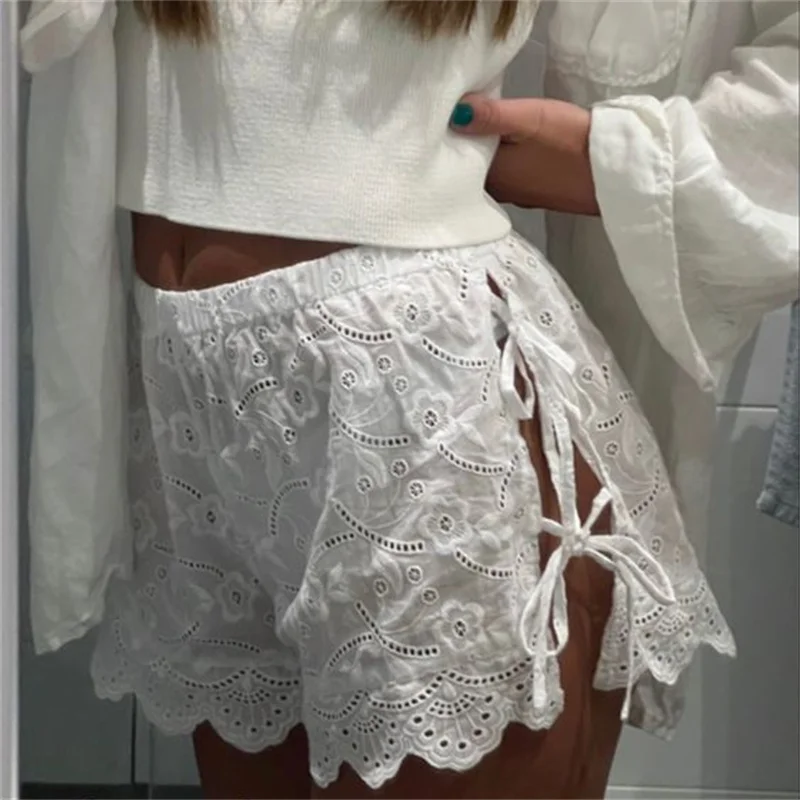 

Women y2k Eyelet Lace Shorts Casual Side Tie up Cutout Elastic Short Pants Vacation Beach Club Streetwear