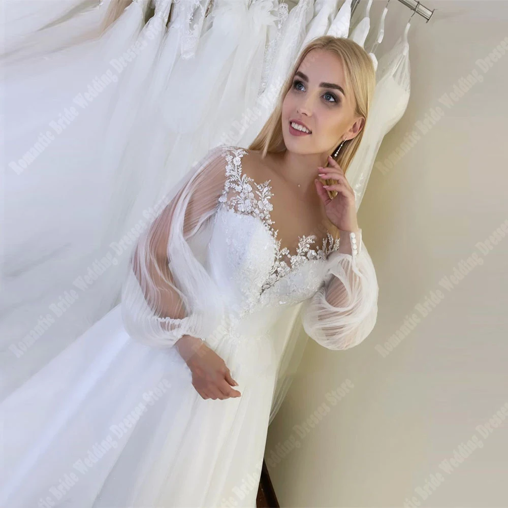 Affascinanti abiti da sposa da donna con stampa in pizzo abiti da sposa Vintage a maniche lunghe con scollo a v superficie in Tulle Princess Vestidos De Novia