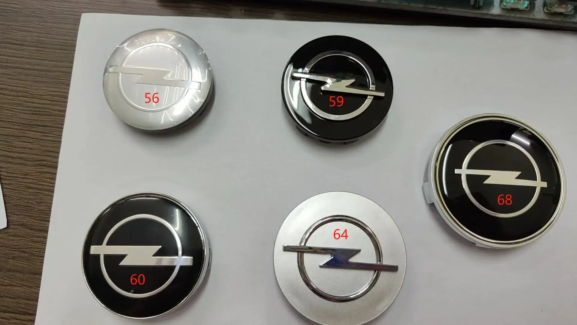4pcs 56mm 59mm 60mm 64mm 68mm Wheel Center Cap Logo Hub Cover Badge Emblem for Opel Insignia Astra J H G F Corsa Zafira Tigra