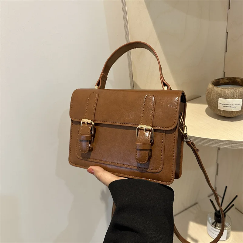 حقيبة نسائية 2023New العصرية الرجعية حقيبة المتخصصة عالية الشعور بلون Crossbody حقيبة مربعة صغيرة دروبشيبينغ