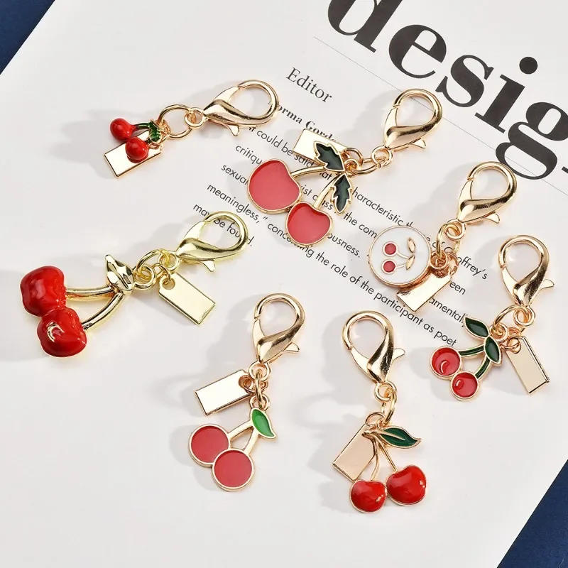 พวงกุญแจรถเชอร์รี่เรซิ่นคริสตัลที่ทันสมัยและประณีตสําหรับสุภาพสตรี, จี้กระเป๋าอุปกรณ์เสริมพวงกุญแจเชอร์รี่