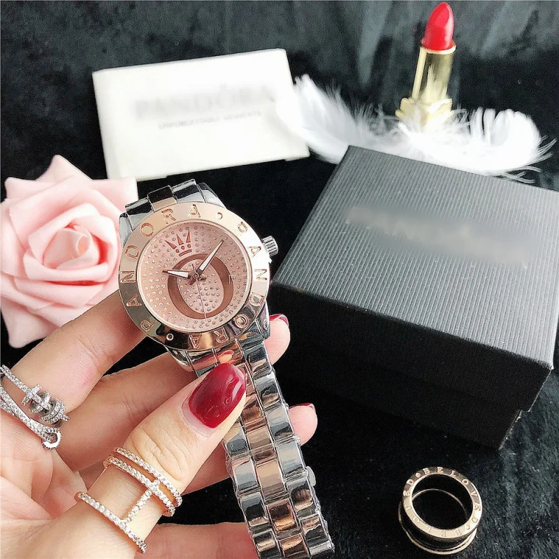 โรงงานโดยตรงนาฬิกาผู้ชายและผู้หญิงธุรกิจนาฬิกาเข็มขัดเหล็กโลหะผสม NewPOEuropean และ American นาฬิกา