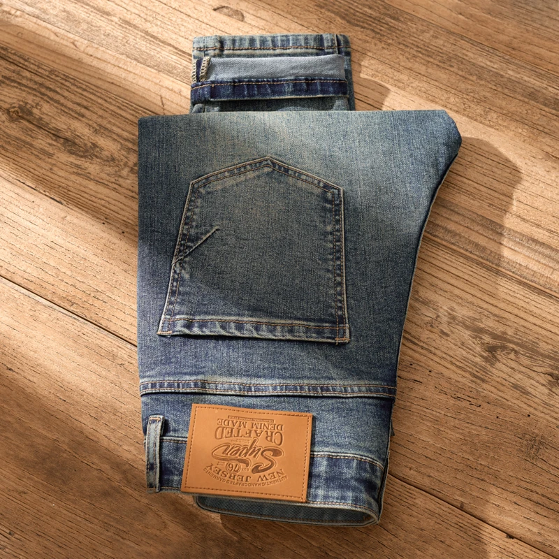 Jeans collant lavati resistenti strappati retrò da uomo Casual versatili pantaloni a matita ricamati pantaloni lunghi nostalgici alla moda