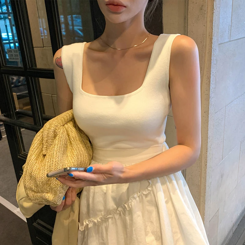 2025 Forefair camisetas sin mangas Sexy Crop chaleco sólido Harajuku coreano mujer fuera del hombro tejido negro blanco verano mujeres Tops