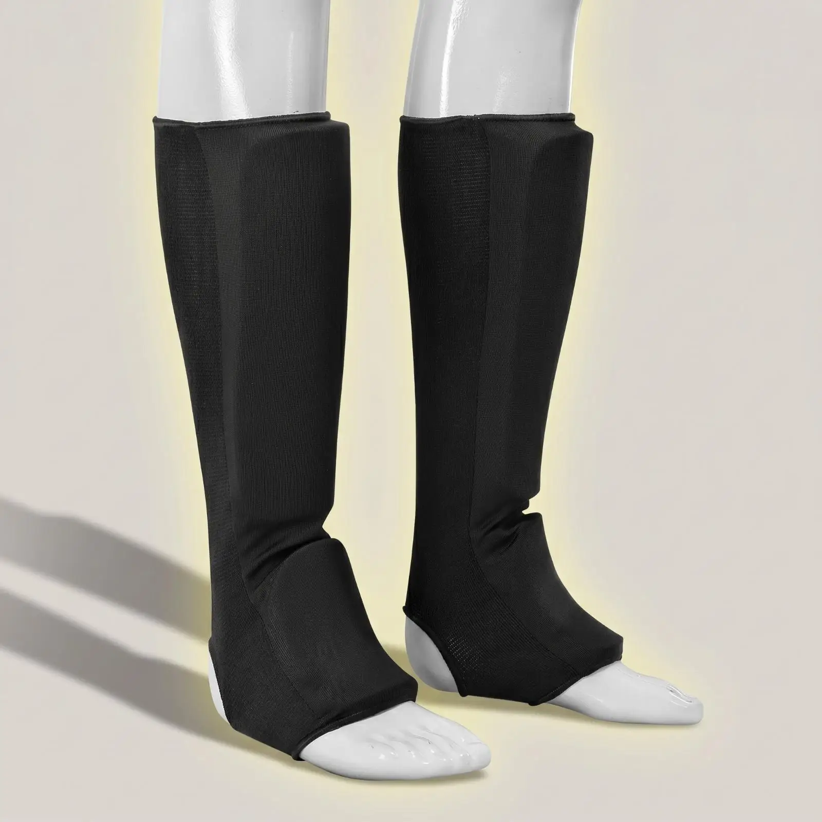 Shock Absorbing Shin Guard Sleeve for Muay Thai Kickboxing and Martial Arts with Anti Slip Elastic Design
