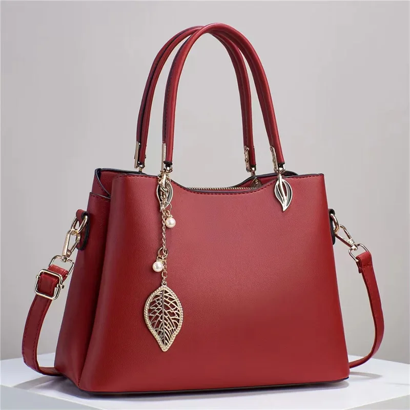 Bolso de mujer 2023 nueva moda de otoño bolso de hombro tipo bandolera atmosférico versátil de gran capacidad bolso de mamá de mediana edad