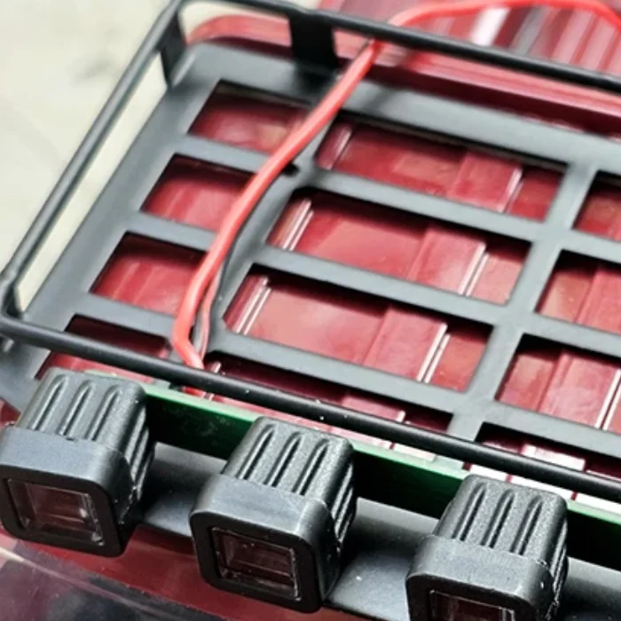 Shiny LED Light-Embellished MN82 Metal Luggage Carrier: Essential Roof Rack Upgrade for RC Model Cars.