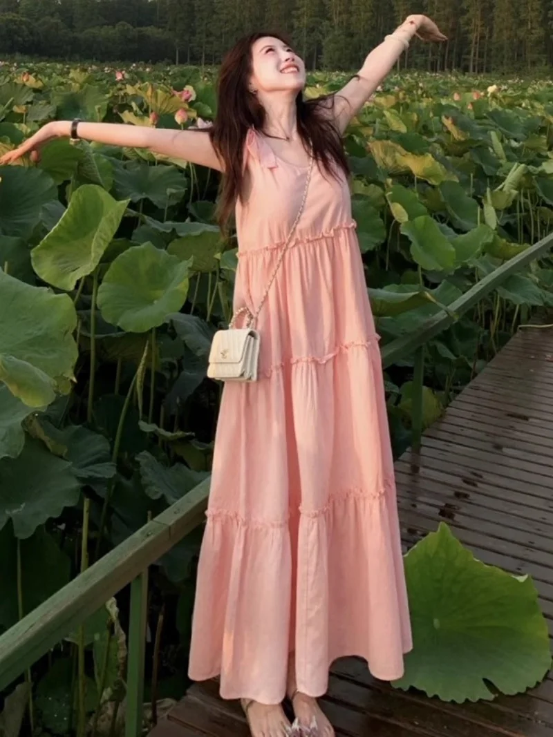 Vestido largo de playa sin mangas 2025 verano rosa francés dulce lindo pequeño fresco correa vestido de vacaciones en la playa w127