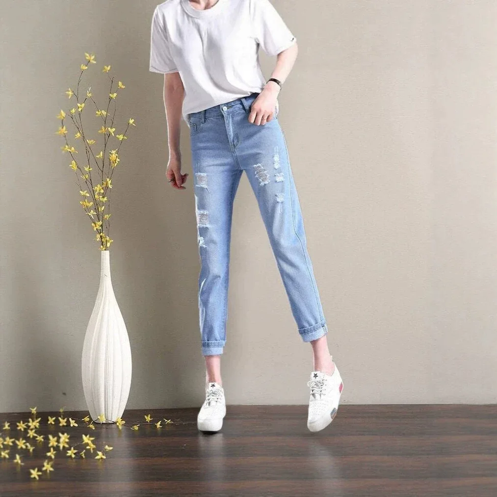 New Women's Casual Loose Slimming Denim Jeans Hole Design Harlan Style Student BF Straight Leg Nine Point Pants Autumn 2026