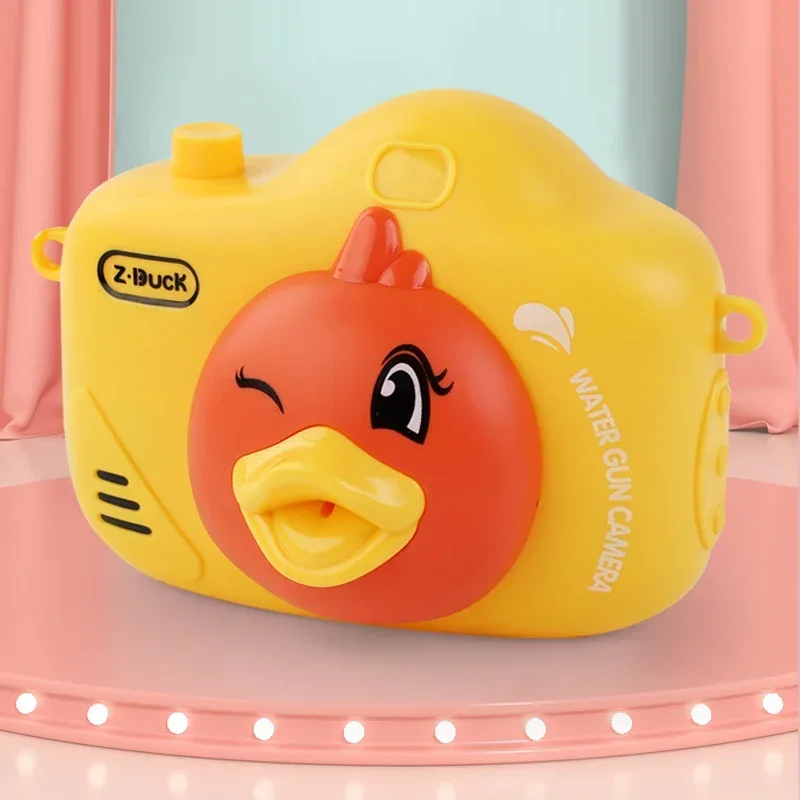 カメラ型水鉄砲おもちゃ 電池不要 携帯用 かわいいアヒル型動物モデル スプレーブラスター プール/お風呂/屋外用お風呂おもちゃ 赤ちゃん/子供向けギフト