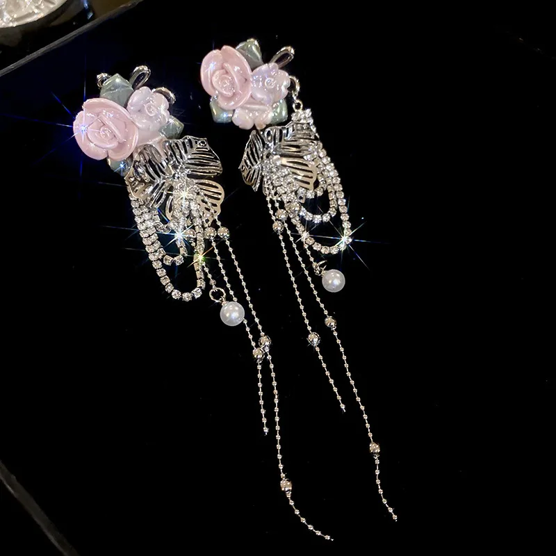 Silver needle flowers pearls, streaming earrings Light luxury high -level sensor ear pendant design sensor, temperament long ear