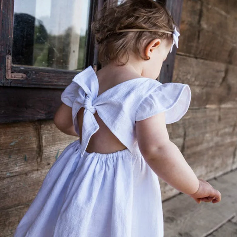 Robe trapèze à lacets en coton et lin pour bébés filles, manches volantes solides, col rond, nœud papillon, robes de princesse décontractées pour tout-petits, été, nouveau