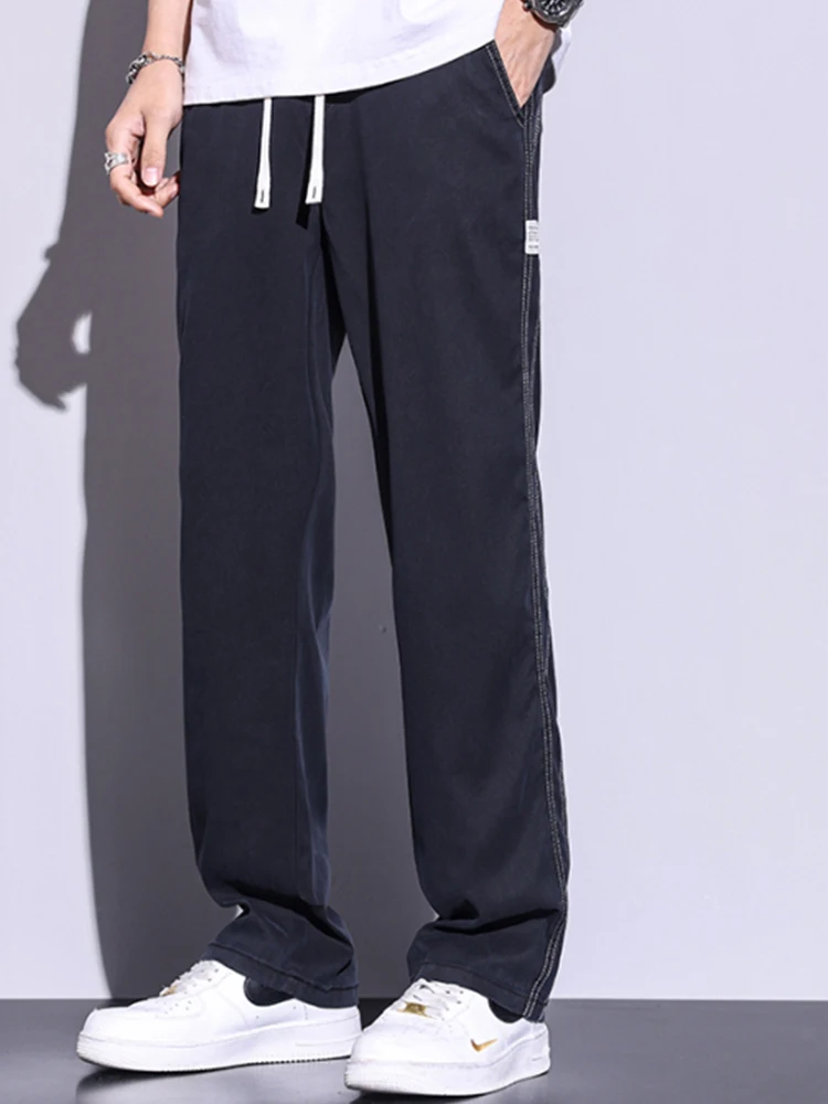 Pantaloni estivi da uomo morbidi e sottili larghi dritti a gamba larga Pantaloni popolari in tessuto Lyocell allentato coreano con coulisse in vita elastica
