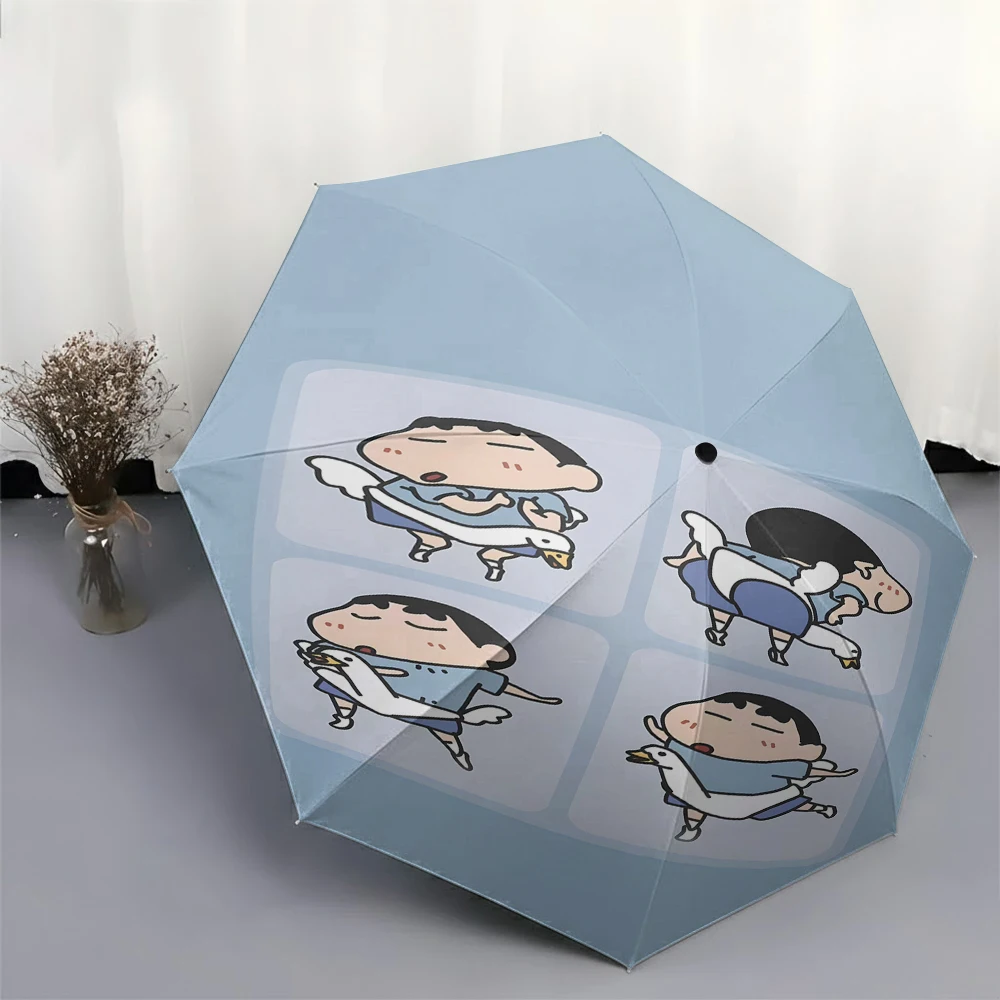 

Crayon Shin-chan Shinnosuke Nohara Four-Panel Cartoon Print Folding Umbrella - Featuring Playful Swan Hugging Poses on Light Blu