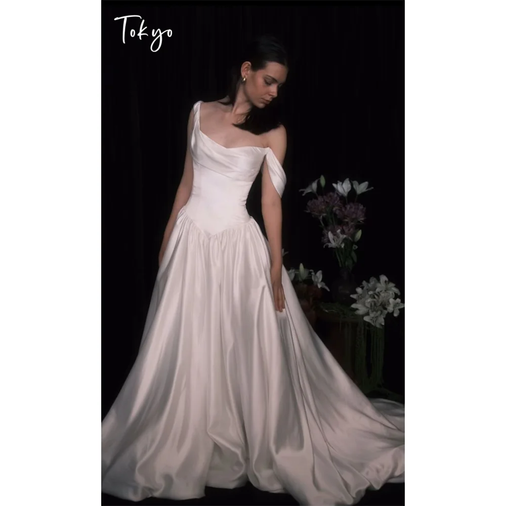 Tokyo Off Shoulder Draped Neckline Wedding Dress Glossy Satin Basque Waist Bridal Gown Inspired Low Back Classic Ball Gown 2026