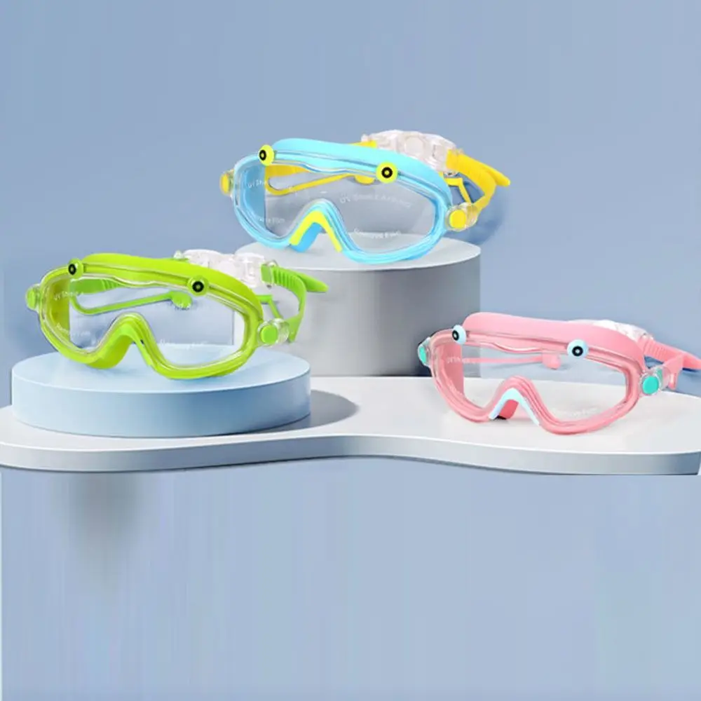 Wodoodporne okulary pływackie z dużą ramką, przeciwmgielne, z zatyczkami do uszu, regulowane, z miękkiego silikonu, dla dzieci.
