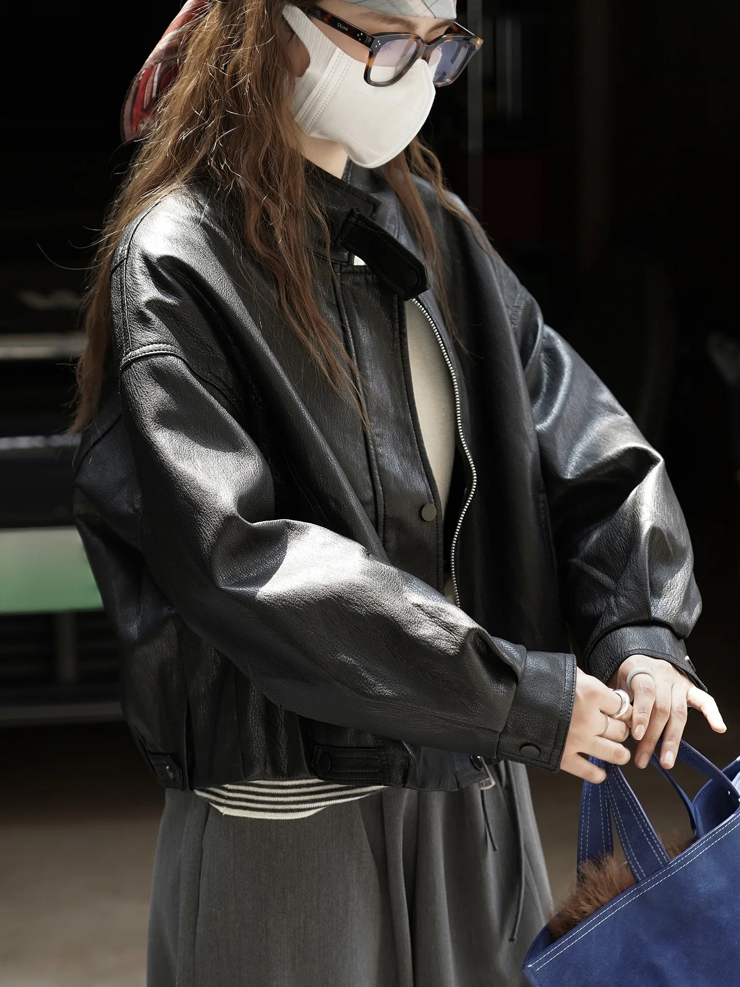 Fashionable and cool stand up collar split short jacket with a stylish silhouette design for women