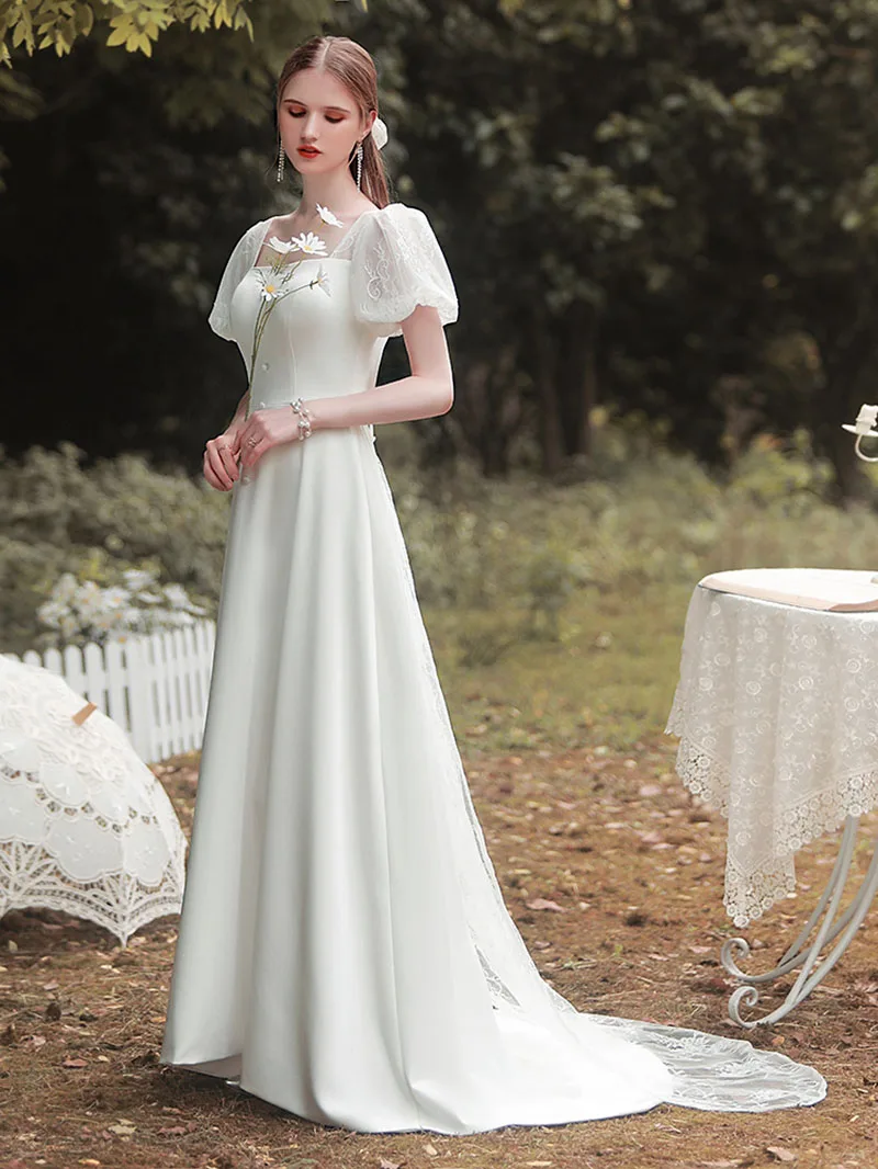 Bellissimi abiti da sposa affascinanti che dimagriscono semplici abiti da sposa Sexy aperti sul retro in pizzo elegante abito da sera