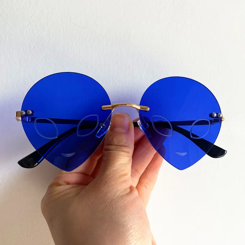 

Funny Sun Glasses Personality Alien Anti-UV Spectacles Simplity Eyeglasses Rimless Google Blue Color Sunglasses Ornamental
