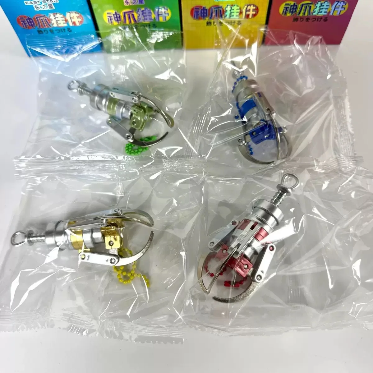 Creative Press Type Catch Dolls Claw Model Keychain Mini Simulation Claw Machine Decompression Keychain Backpack Pendant