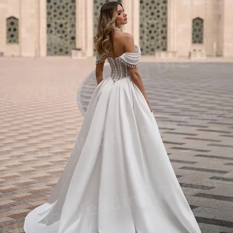 فساتين زفاف أنيقة على شكل حرف A للسيدات مكشوفة الكتف واللؤلؤ من Vestido De Novia بدون أكمام فساتين العروس مخصصة رداء De Mariée