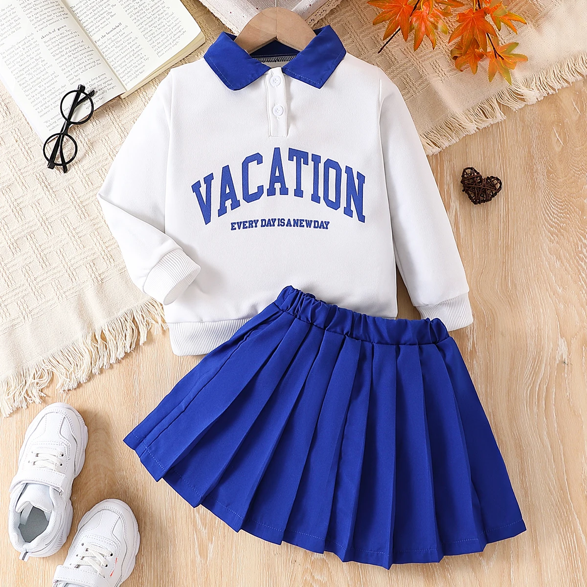 Two piece girls\' letter printed college style lapel long sleeved ribbed drawstring top and pleated skirt set