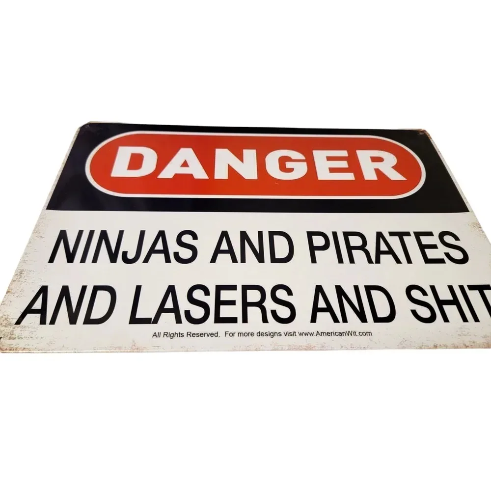 

GEEKWARNEDGE "Ninjas Pirates Lasers & Fictional Foes" Metal Sign | Rustic Decor for Game Rooms