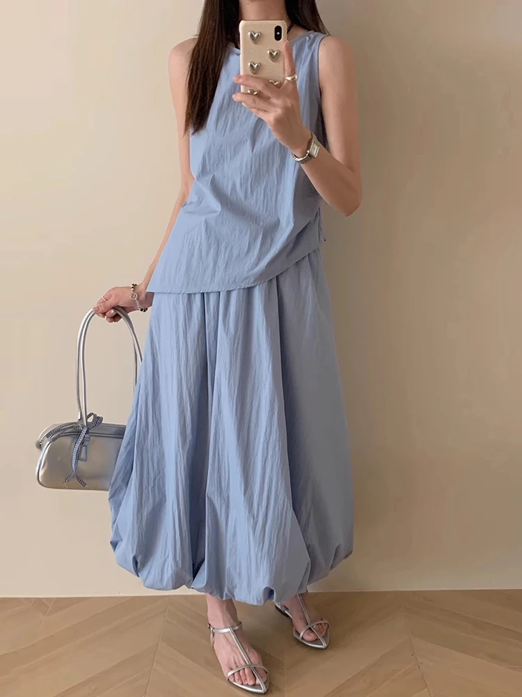 

Clothland Women Elegant Two Piece Set Sleeveless Irregular Shirt Midi Skirt Summer Casual Two Piece Suit TA494