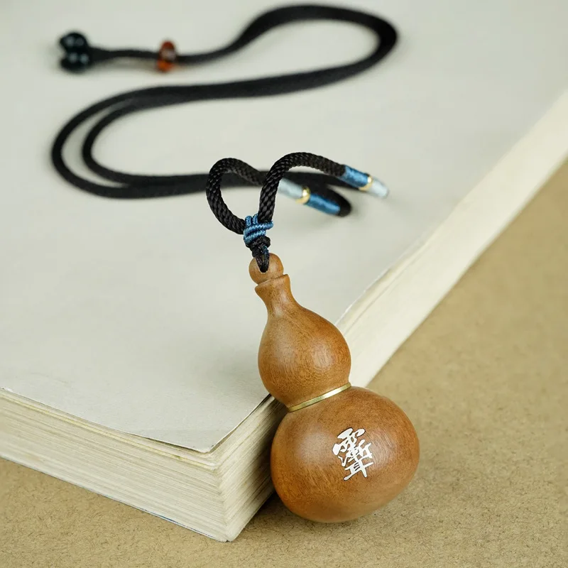 

Черное дерево мармеладного дерева с серебряным лагестрогемным индикатором тыквы, подвесной подвесной кулон, китайский большой ковш, даосские украшения, счастливый кулон