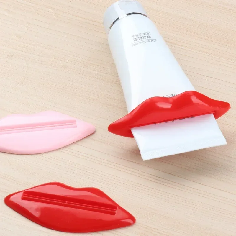 1Pcs Top Sale Sexy Hot Lip Kiss Bathroom Tube Dispenser Toothpaste Cream Squeezer Home Tube Rolling Holder Squeezer Random Color