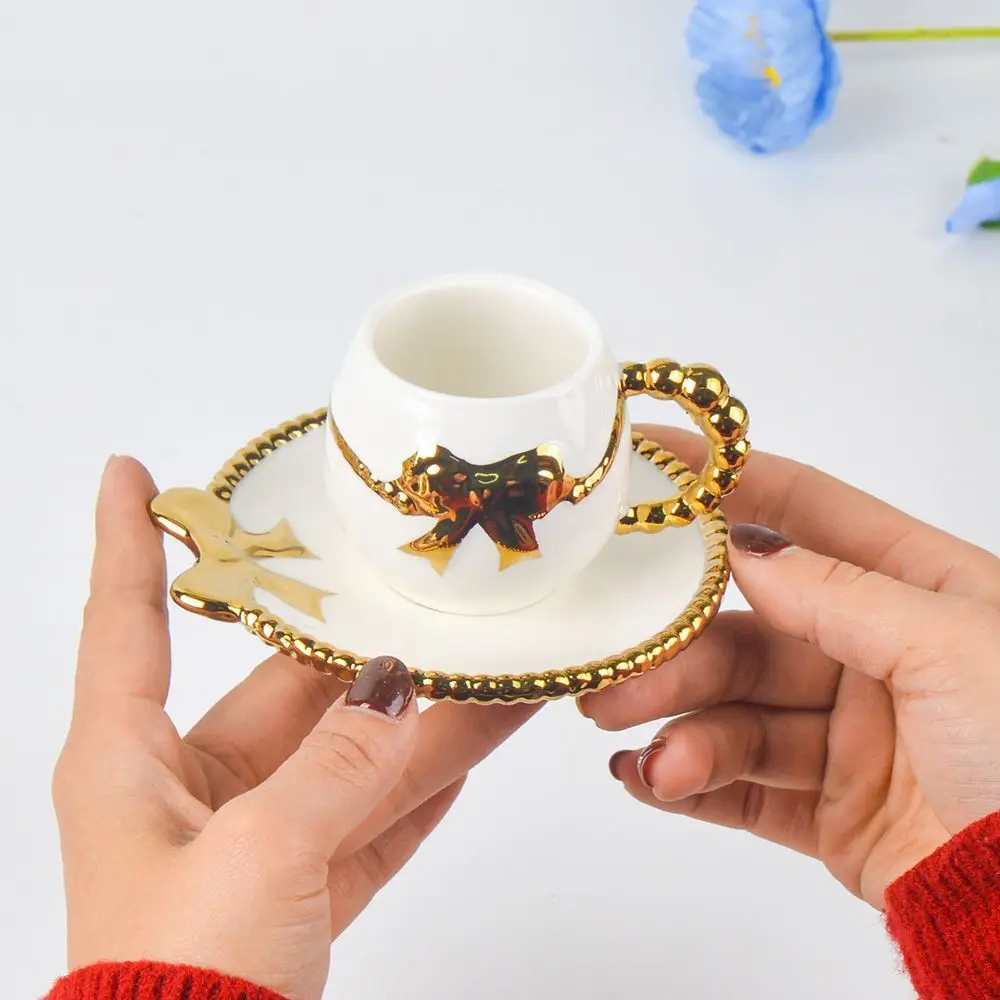 Neue kreative einfache Schmetterling Tasse Tee Tassen und Untertassen Set goldenen Griff Tasse Untertasse High-End-Nachmittagstee Tassen Porzellan 90 ml