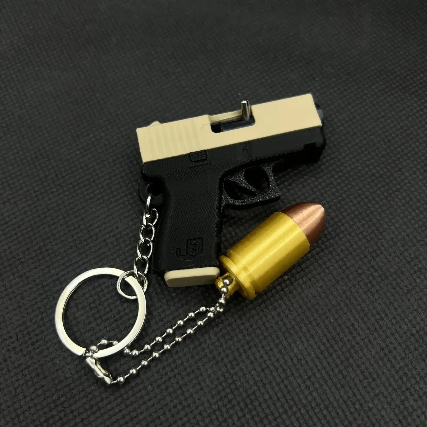1 pz NUOVO portachiavi stampato in 3D può fuoco piccole palline mini proiettile morbido pistola giocattoli ciondolo zaino