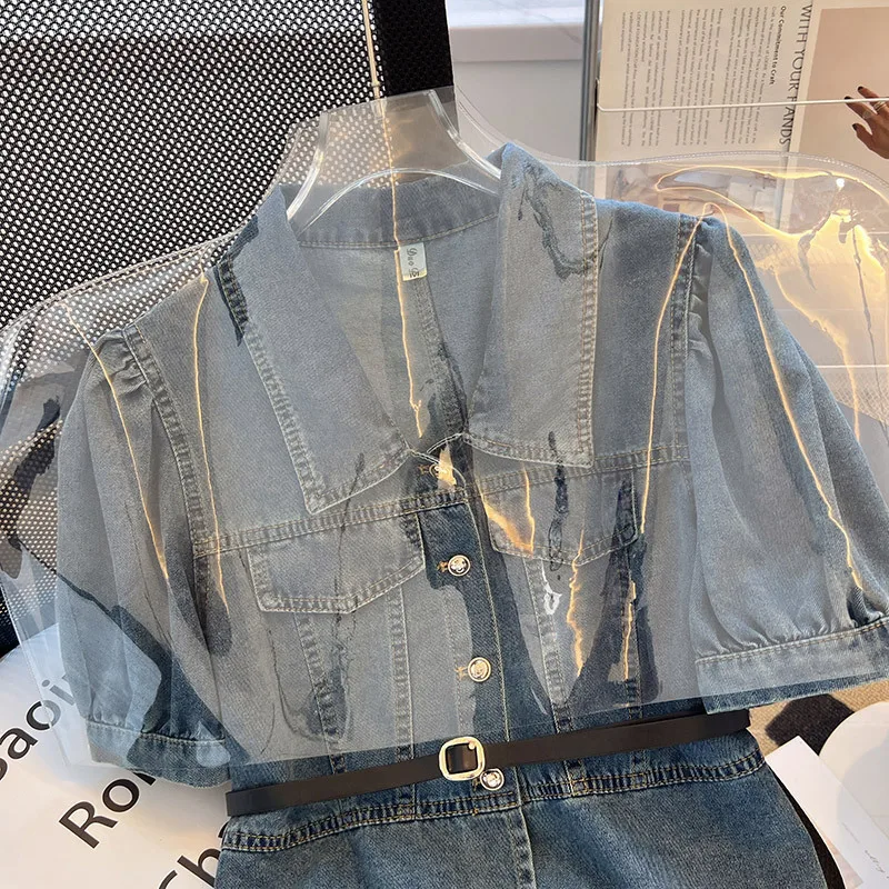 Retro puff sleeve denim shirt female summer thin Korean version of loose slim waist top fashion temperament short coat.