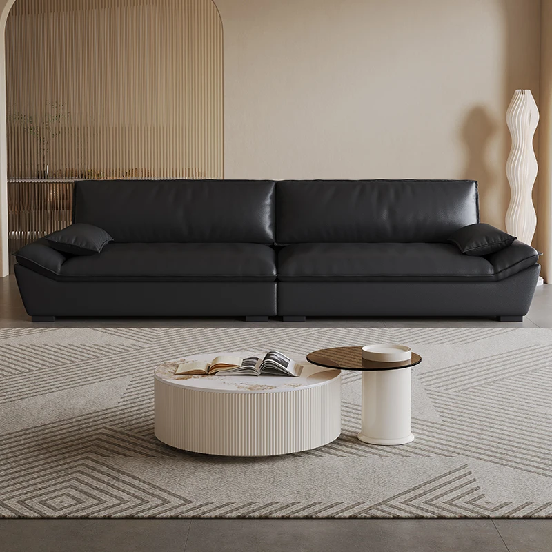 

Italian minimalist cat scratching leather sofa living room small apartment modern minimalist three-person straight row sailing