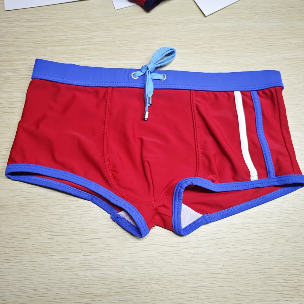 2026Dark blue and orange color matching swimming trunks men's swimming trunks, men's tethered boxers wholesale 50812-60902