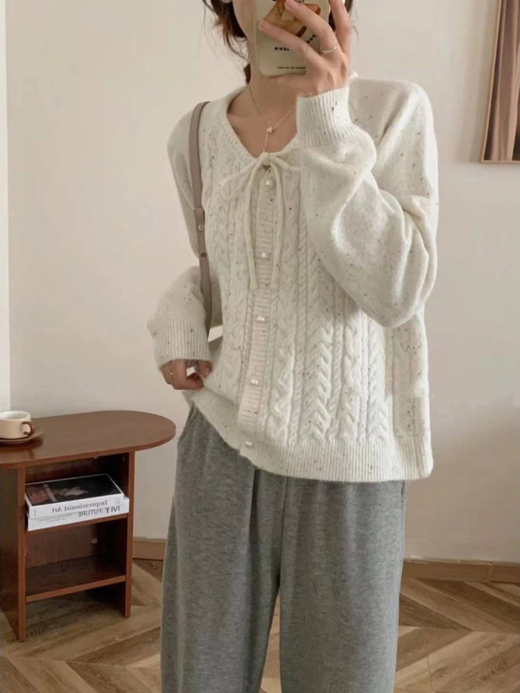 Jesienne nowe sweter Vintage dzianinowe płaszcze z dekoltem w szpic jednorzędowe sznurowane swetry w kropki styl Preppy wszystkie ubrania damskie