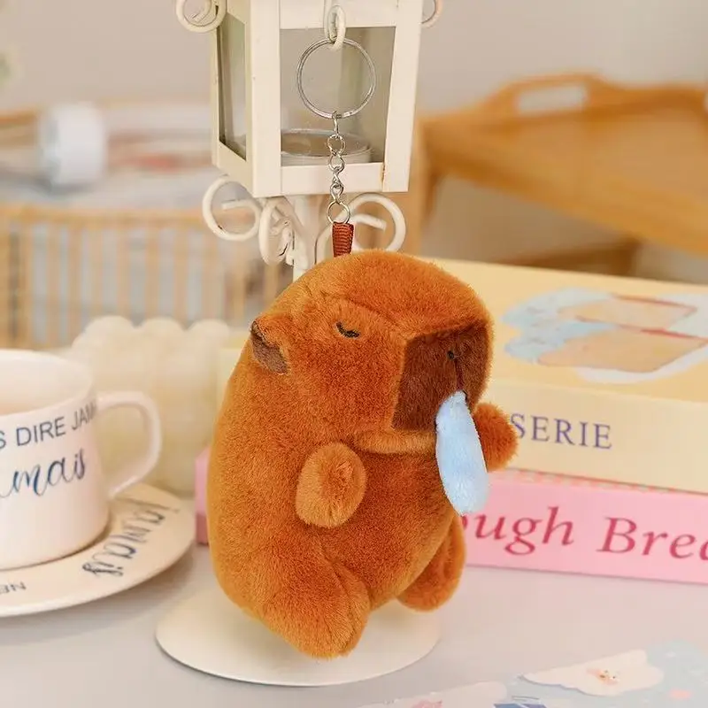 أحدث قلادة حقيبة ظهر لدمية كابيبالا تهز الأذن مملوءة بالألعاب القطيفة وهدايا الرسوم المتحركة اللطيفة والدمى المثيرة للاهتمام