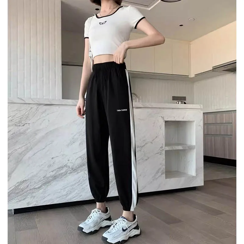 

2024 Fall nine back pants women's patchwork striped loose leg casual pants fashion brand solid color all-in-one pants