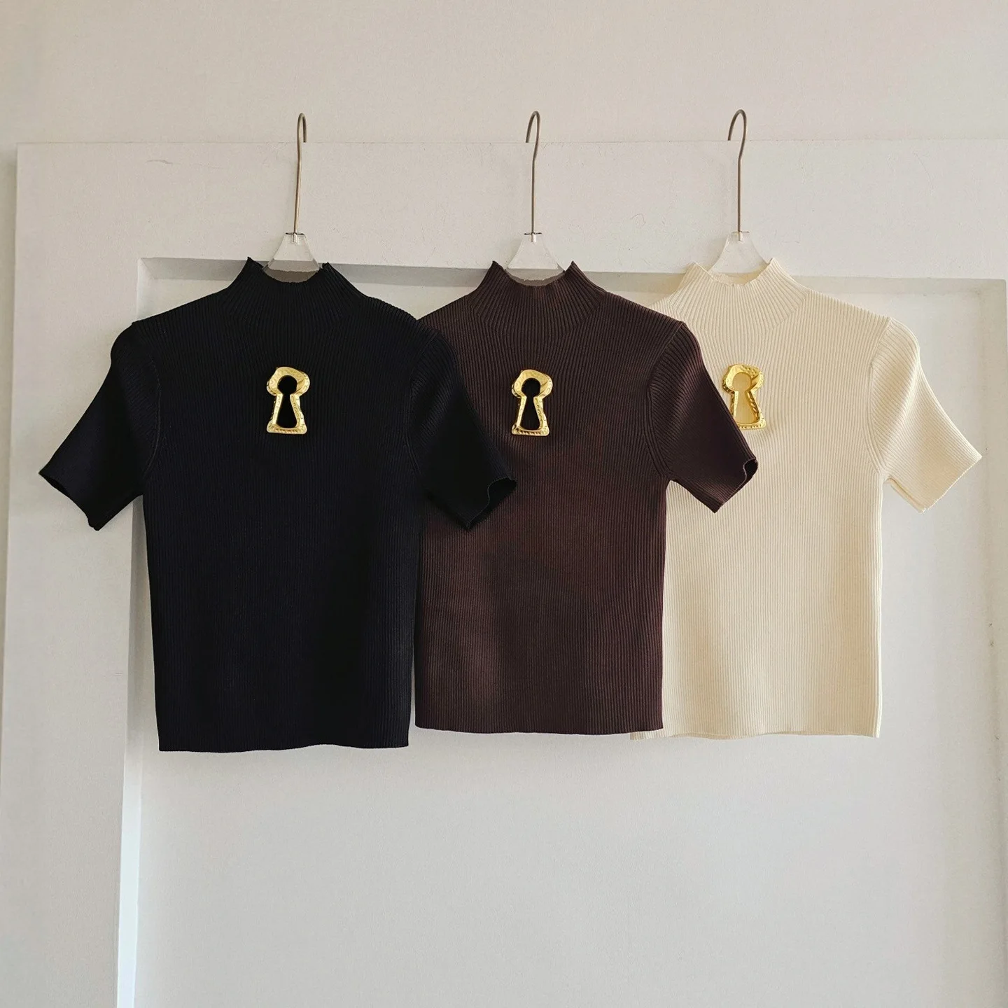 

High Quality Summer New Hollowed Out Stand Up Collar Knitted Sweater Tshirt Women Commuting Slimming Sweater T-shirts Top