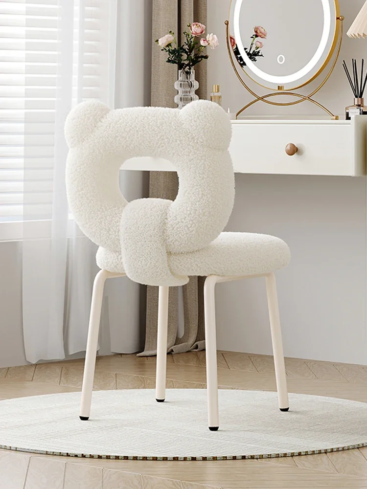 

Makeup chair girls bedroom dressing stool manicure stool leisure dining chair modern minimalist cream wind backrest.