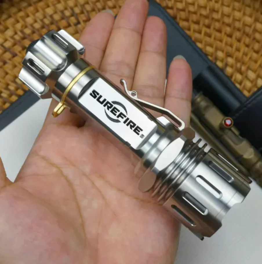 Used EDC Titanium alloy flashlight Primary color surface Outdoor Tools Strong Light Torch Lamp Decompression Toy