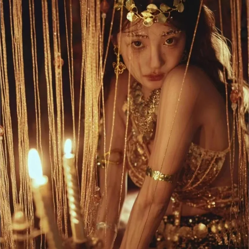 A new style of exotic travel photography with golden top starry chiffon pleated skirt