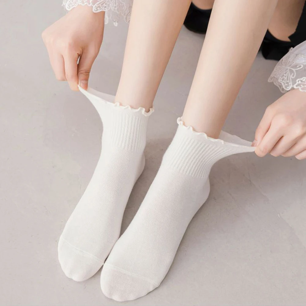 Kaus kaki wanita longgar putih JK kaus kaki Jepang musim semi lucu pendek tabung musim panas Tengah hitam putih Ruffle kaus kaki katun Lolita manis musim dingin