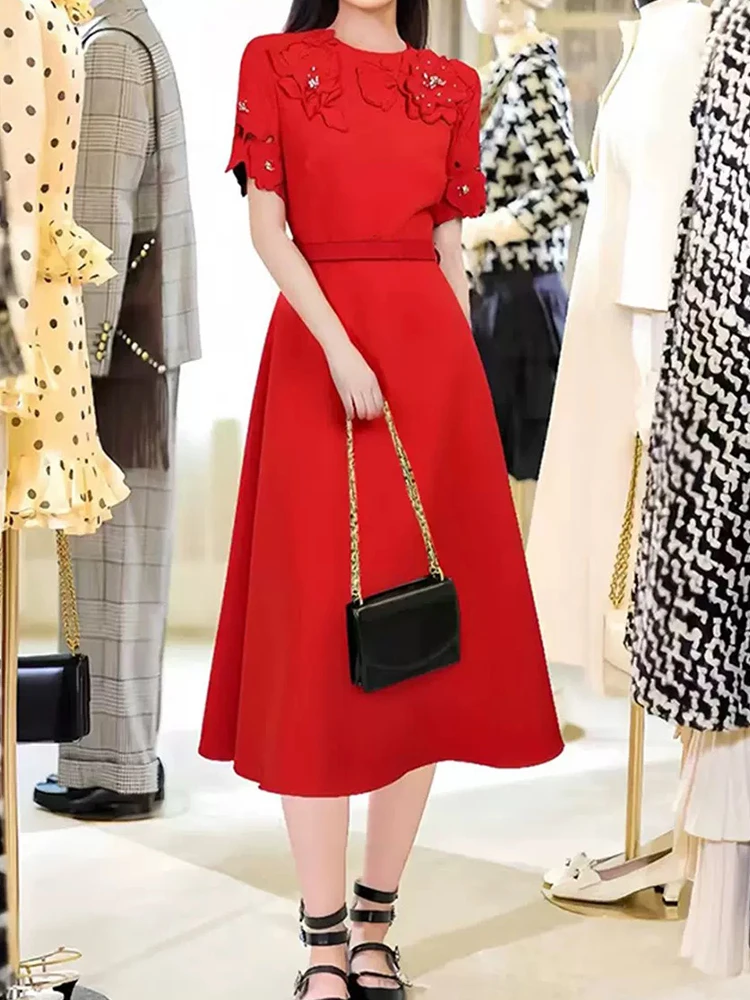 

High-grade embroidery nail drill three-dimensional flower dress female 2025 summer new short-sleeved belt big swing A-line skirt