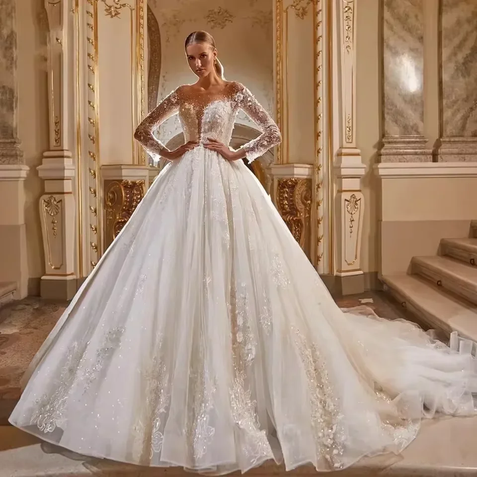 Luxury Puffy Wedding Dress 2026 Long Sleeve Sheer O Neck 3D Flowers Lace Beads Birde Bridal Gowns Vestido De Novia