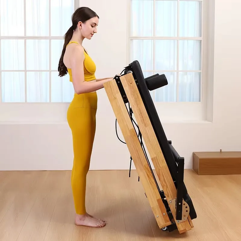 

YTYIN Professional Grade Foldable Pilates Reformer: Dual-Purpose Wooden Equipment for Gym & Home Yoga Studio