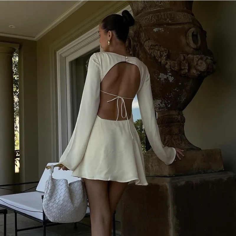 2026 Sexy Hollowed-out Backless Strap-up Dress Temperament Swing Collar Long-sleeved Short A-shaped Skirt