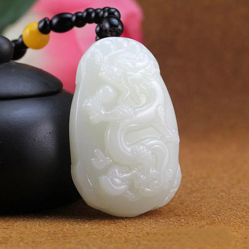 

Hetian seed material, sheep fat white pendant, hand-held piece, jade flying ornament, unisex style