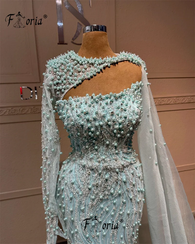 Robe de sirène perlée verte menthe, robe de soirée élégante, robe de soirée fendue, cape longue, manches longues, perles, Dubaï, célébrité, mariage