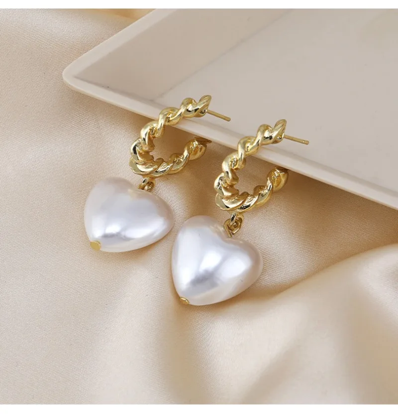 ต่างหูรูปหัวใจที่ทันสมัยและเรียบง่ายต่างหูสตั๊ดเข็มเงิน S925 สําหรับสุภาพสตรีต่างหูทรงเรขาคณิต